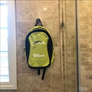 Wilson backpacks in green and orange